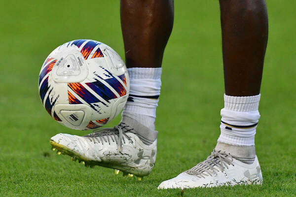 Soccer ball on foot